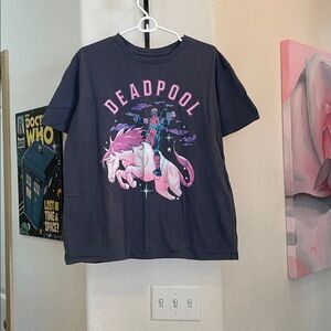 Pink Graphic T-Shirt of Deadpool riding a Unicorn